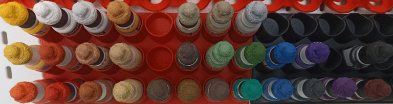Fig. 3. A photo of my paint collection, physically arranged according to the order produced by the PCA-based sorting algorithm.